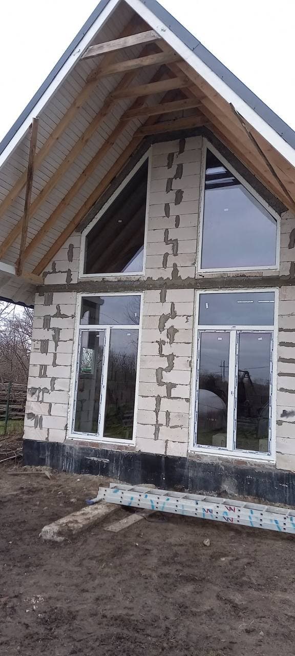 Частный дом после остекления